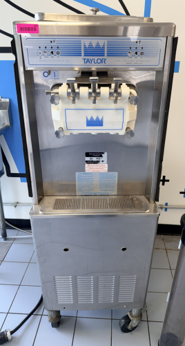 2014 TAYLOR FLOOR-MODEL SOFT SERVE ICE CREAM MACHINE, 3-PHASE COMMERCIAL UNIT, MODEL 336-33, TWIN-TWIST DISPENSING HEAD, AIR-COOLED, STAINLESS STEEL CONSTRUCTION ON CASTERS.