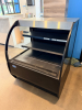 FEDERAL CURVED GLASS REFRIGERATED DISPLAY CASE WITH BLACK FINISH, THREE TIER INTERIOR SHELVING, TEMPERED GLASS SIDES, AND STAINLESS STEEL TOP. - 2