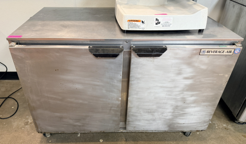 BEVERAGE-AIR TWO DOOR UNDERCOUNTER REFRIGERATOR WITH STAINLESS STEEL CABINET, STAINLESS STEEL TOP, AND ADJUSTABLE INTERIOR STORAGE.