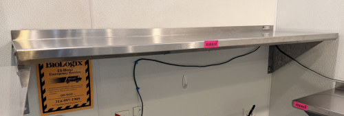 48" X 16" STAINLESS WALL SHELF.