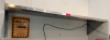 48" X 16" STAINLESS WALL SHELF. - 2