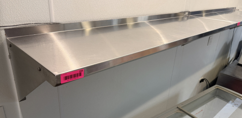 48" X 16" STAINLESS WALL SHELF.