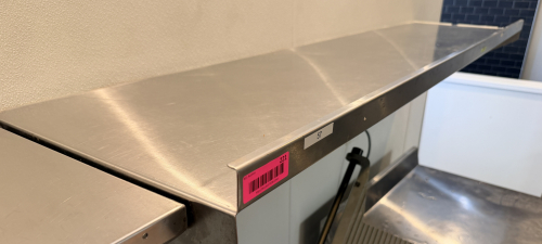 48" X 16" STAINLESS WALL SHELF.