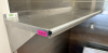 48" X 16" STAINLESS WALL SHELF.