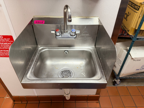 WALL MOUNTED STAINLESS HAND SINK.
