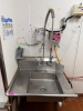 LEFT SIDE STAINLESS SOIL TABLE W/ SPRAYER SINK.