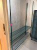 72" X 18" FOUR TIER COATED WIRE SHELF ON CASTERS.