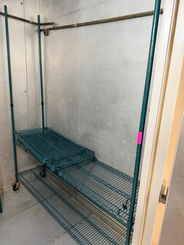 72" X 18" FOUR TIER COATED WIRE SHELF ON CASTERS.
