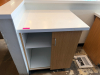 THREE PIECE LAMINATE CABINET AND COUNTER STATION SET WITH WHITE SOLID SURFACE COUNTERTOPS, STORAGE CABINETS, AND OPEN SHELVING. - 2