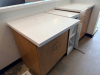 THREE PIECE LAMINATE CABINET AND COUNTER STATION SET WITH WHITE SOLID SURFACE COUNTERTOPS, STORAGE CABINETS, AND OPEN SHELVING. - 3