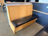 (2) SECTIONS OF 50" WOODEN BOOTH SEATING W/ BLACK PADDED SEAT CUSHIONS. - 4