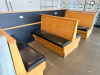 (2) SECTIONS OF 50" WOODEN BOOTH SEATING W/ BLACK PADDED SEAT CUSHIONS. - 5