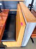 (2) SECTIONS OF 50" WOODEN BOOTH SEATING W/ BLACK PADDED SEAT CUSHIONS. - 6