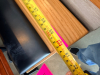 (2) SECTIONS OF 50" WOODEN BOOTH SEATING W/ BLACK PADDED SEAT CUSHIONS. - 7