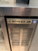BEVERAGE-AIR BACK BAR REFRIGERATOR WITH TWO GLASS SWING DOORS, INTERNAL WIRE SHELVING, AND SELF-CONTAINED REFRIGERATION SYSTEM. UNIT FEATURES A STAINLESS STEEL TOP AND BLACK TRIM ACCENTS. - 2