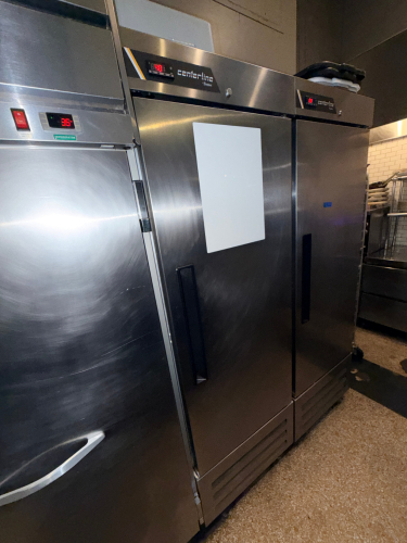 TRAULSEN SINGLE SECTION REACH-IN FREEZER WITH FULL HEIGHT SWING DOOR, DIGITAL TEMPERATURE DISPLAY, AND BOTTOM-MOUNT REFRIGERATION SYSTEM