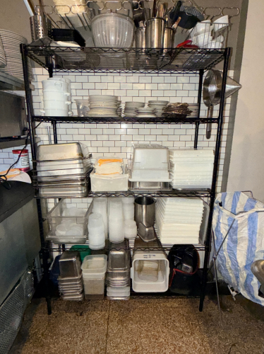 48" X 18" FIVE TIER BLACK WIRE SHELF.