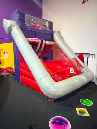 INFLATABLE &ldquo;HOOPS!&rdquo; INTERACTIVE BASKETBALL GAME WITH DUAL BASKET TARGETS, BALL RETURN LANE, AND MULTIPLE SOFT FOAM BASKETBALLS. SUITABLE FOR INDOOR PARTY OR EVENT USE.