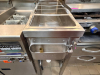 STAINLESSDUMP STATION W/ OVER HEAD HEAT LAMP AND SECTIONED DROP IN FOR INSERTS. - 4
