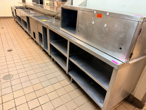 20' STAINLESS KITCHEN LINE W/ STORAGE, WATER DISPENSERS, REFRIGERATED WELLS, AND HEATED DROP INS.