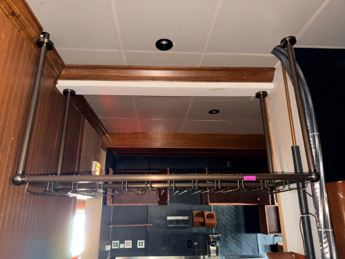48" BRASS CEILING MOUNTED GLASS RACK.