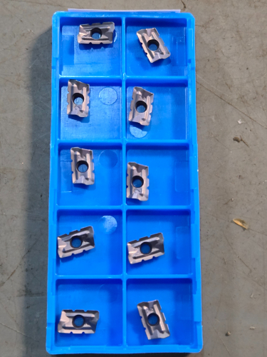 (1) CARBIDE MILLING INSERTS