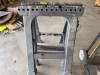 (1) PAIR OF PLASTIC SAW HORSE STANDS.
