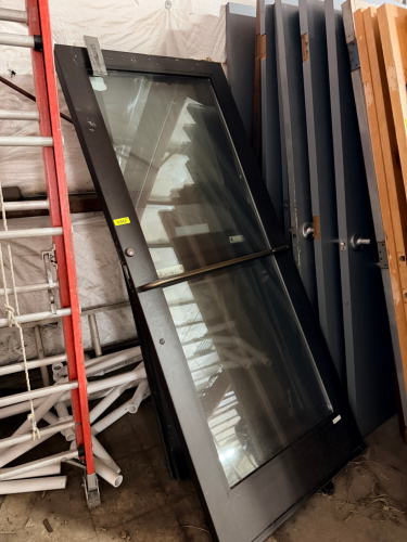 (2) 36" X 80" METAL EXTERIOR DOORS W/ GLASS CENTERS.