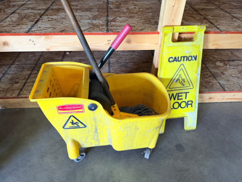 YELLOW MOP BUCKET AND WRINGER.