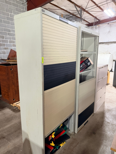 (2) 48" METAL SHELVES W/ RETRACTABLE SECURITY DOORS.