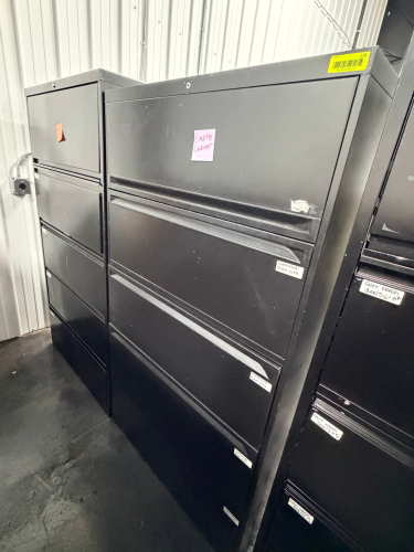 (2) FOUR DRAWER BLACK LATERAL FILE CABINETS.