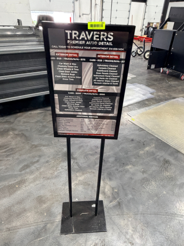 METAL SIGN STAND.