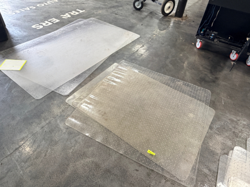 (4) CLEAR PLASTIC CHAIR MATS.