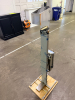 ECOCARE PERSONNEL HYGIENE SYSTEMS ECOCARE NTFS HANDS-FREE SANITIZING STATION. STAINLESS STEEL FLOOR-MOUNT UNIT WITH INTEGRATED DISPENSING SYSTEM AND FOOT PEDAL ACTUATION.
