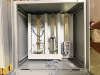 HOFFMAN ELECTRICAL CONTROL PANEL ENCLOSURE WITH PRE-WIRED TERMINAL BLOCKS, DIN RAIL COMPONENTS, STATUS INDICATOR LIGHTS, AND VIEWING WINDOW. STEEL NEMA-TYPE ENCLOSURE WITH LOCKING HANDLE. INTERIOR CONTAINS TERMINAL STRIPS, CIRCUIT PROTECTION COMPONENTS, A - 2