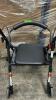 (1) NOVA GETGO PETITE WALKER WITH BLUE ACCENTS AND PADDED SEAT AND STORAGE
