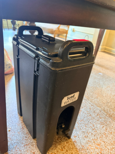 BLACK INSULATED PLASTIC BEVERAGE DISPENSER.