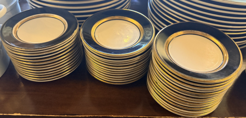 (48) 5 1/2" HOMER LAUGHLIN CHINA PLATES GLOSS BLACK RIM WITH IVORY CENTER.