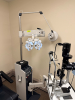 BURTON XL3000 OPHTHALMIC EXAMINATION SYSTEM WITH SLIT LAMP, PHOROPTOR, EXAM TABLE, AND OVERHEAD LIGHTING ASSEMBLY. INCLUDES ARTICULATING INSTRUMENT ARM, CONTROL CONSOLE, BINOCULAR MICROSCOPE, AND PATIENT POSITIONING TABLE - 2