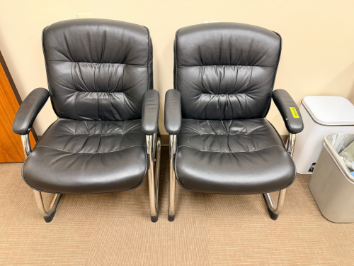 (2) BLACK PLEATHER OFFICE ARM CHAIRS