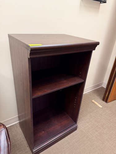 WOOD VENEER OPEN BOOKCASE WITH SINGLE ADJUSTABLE SHELF, MOLDED TOP EDGE, AND BASE TRIM. DARK ESPRESSO FINISH WITH OPEN STORAGE DESIGN.