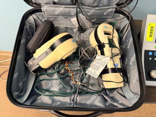NIDEK KM-500 HANDHELD AUTO KERATOMETER SET WITH CARRYING CASE AND ACCESSORIES.