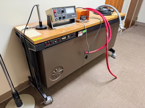 COHERENT MEDICAL DIVISION SYSTEM 900 ARGON LASER PHOTOCOAGULATOR WITH CONTROL CONSOLE, FOOT PEDAL, COOLING / POWER BASE UNIT, AND ATTACHED CABLING.