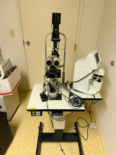 DIGITAL SLIT LAMP / OPHTHALMIC IMAGING SYSTEM WITH FUNDUS CAMERA, MOTORIZED TABLE, AND CANON DSLR CAMERA ATTACHMENT.