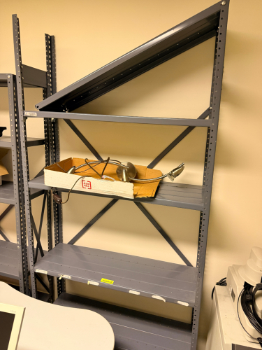 (2) 48" X 12" METAL STORAGE SHELVES.
