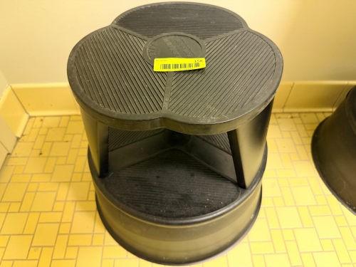 (2) ROLL ABOUT BLACK PLASTIC STEP STOOLS.