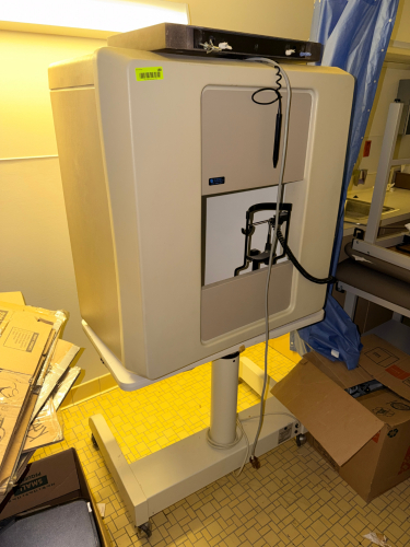 ALLERGAN HUMPHREY FIELD ANALYZER MODEL 640 VISUAL TESTING SYSTEM WITH MOBILE STAND, PATIENT POSITIONING ASSEMBLY, CONTROL INTERFACE, AND ENCLOSED TEST CHAMBER.