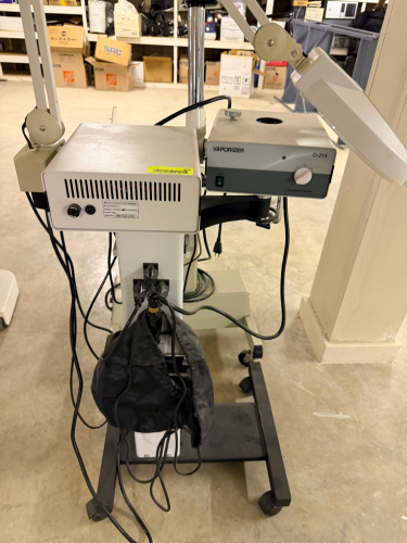 MULTI-FUNCTION ESTHETIC / FACIAL TREATMENT WORKSTATION WITH VAPORIZER, MAGNIFYING LAMP, AND ACCESSORY MODULES ON ROLLING STAND