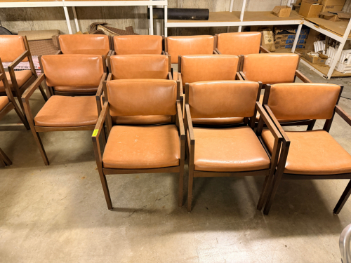 (11) WOODEN AND BROWN VINYL ARM CHAIRS.