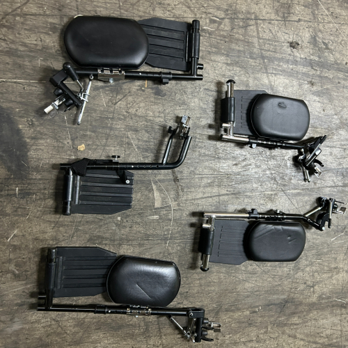 (1) LOT OF ASSORTED WHEEL CHAIR LEG RESTS